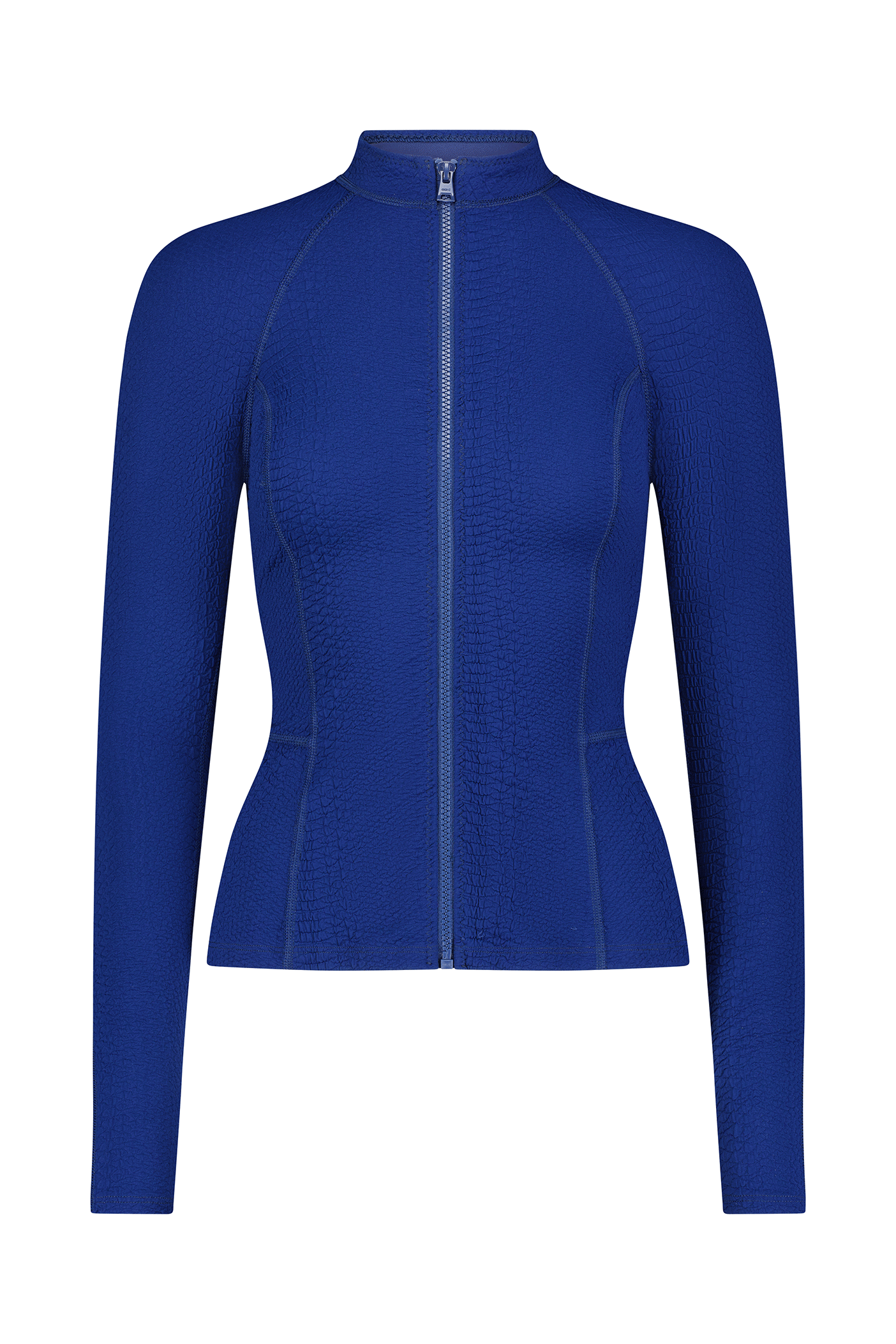 The Natasha Jacket by Gigi C Sport features a blue long-sleeved, fitted design with textured fabric. It includes seam detailing, a high collar, and a full-length zipper for a tailored look, making it essential for your wardrobe.