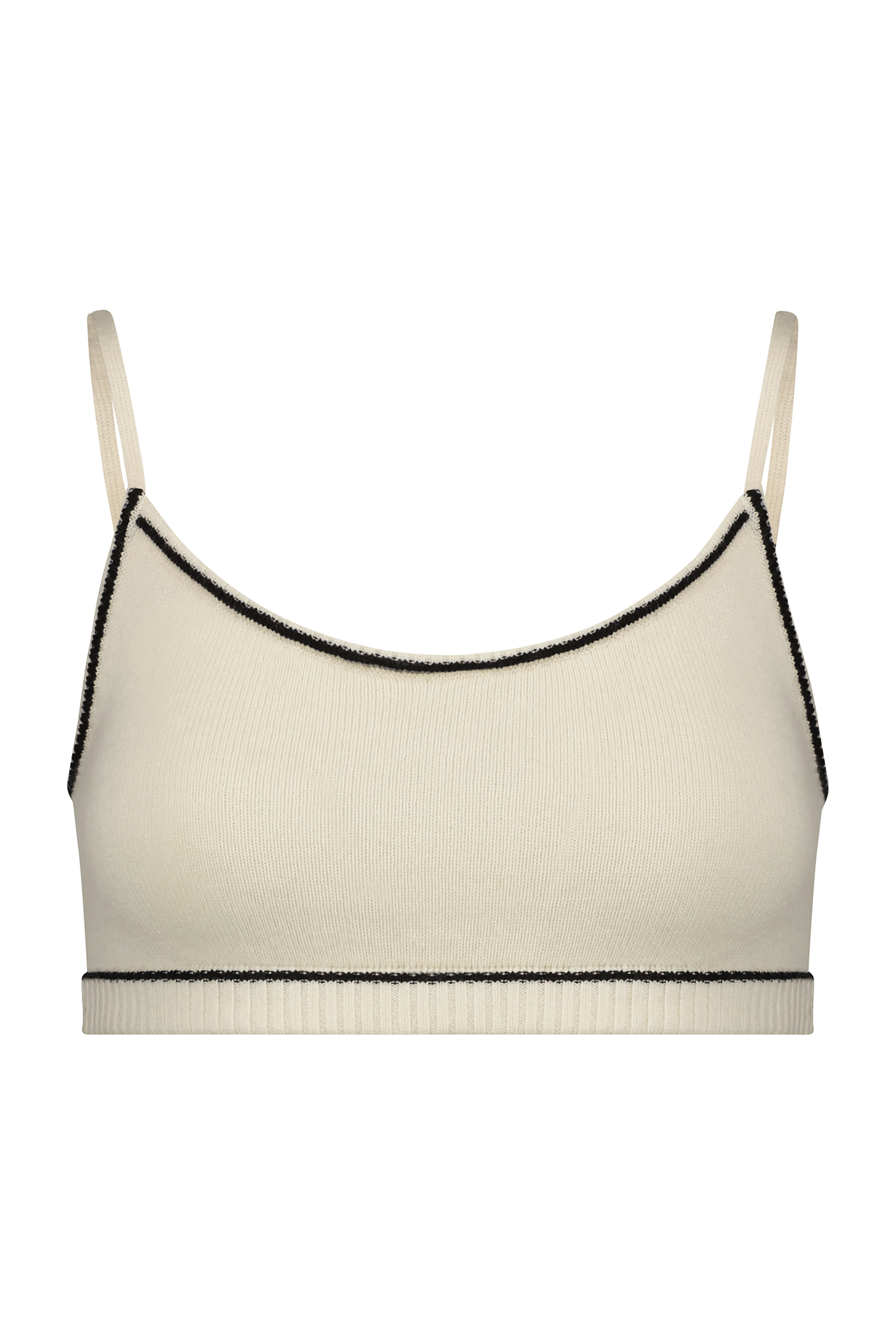 The Danica Bralette by Gigi C Lounge is a cream-colored crop top with thin straps and black trim. Made from a wool-cashmere blend, its ribbed fabric offers luxurious texture and minimalist style.