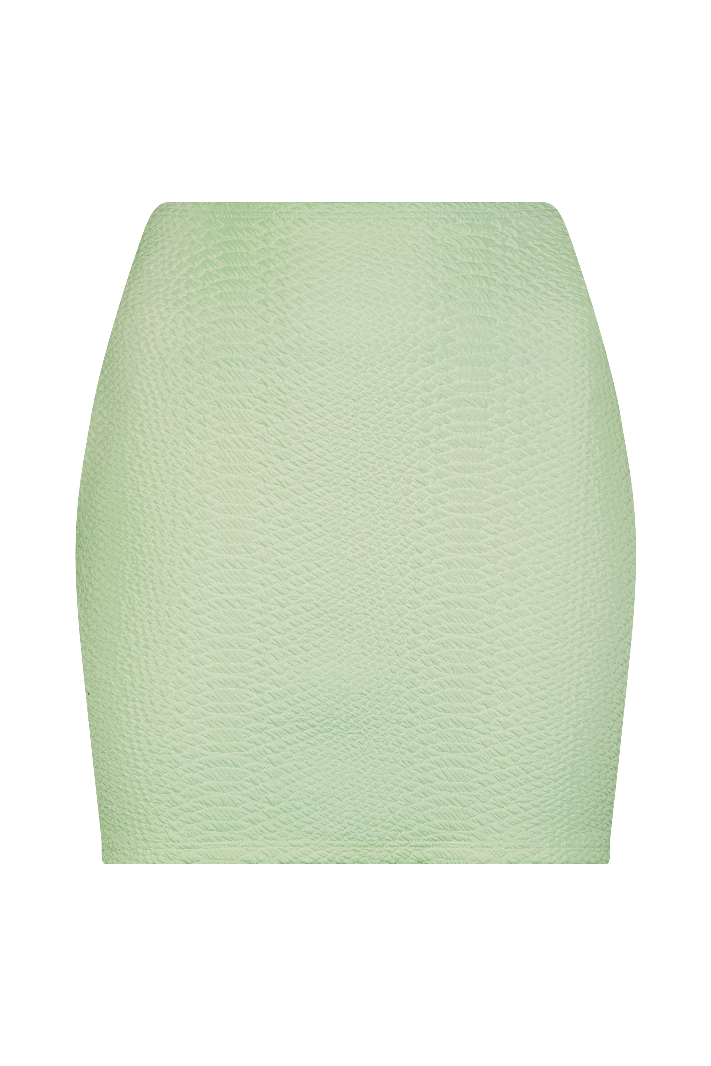 Introducing the Joelle Skirt by Gigi C Bikinis: a light green, high-waisted skirt made from luxurious waffle jacquard. Its textured, fitted silhouette pops against a simple black backdrop.